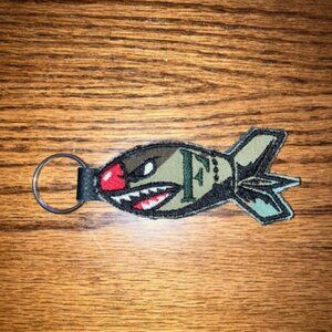 Flying Tigers nose art themed embroidered bomb camouflage key chain on leather